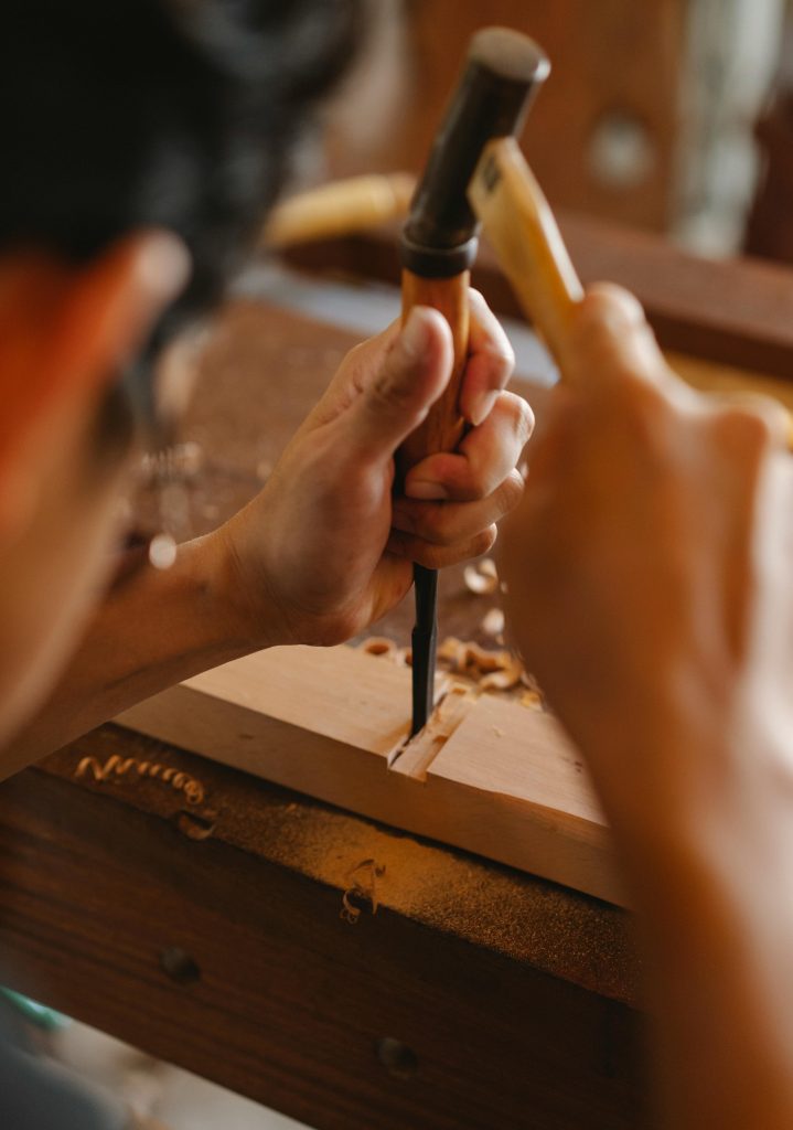 Crop joiner cutting joint in hardwood plank